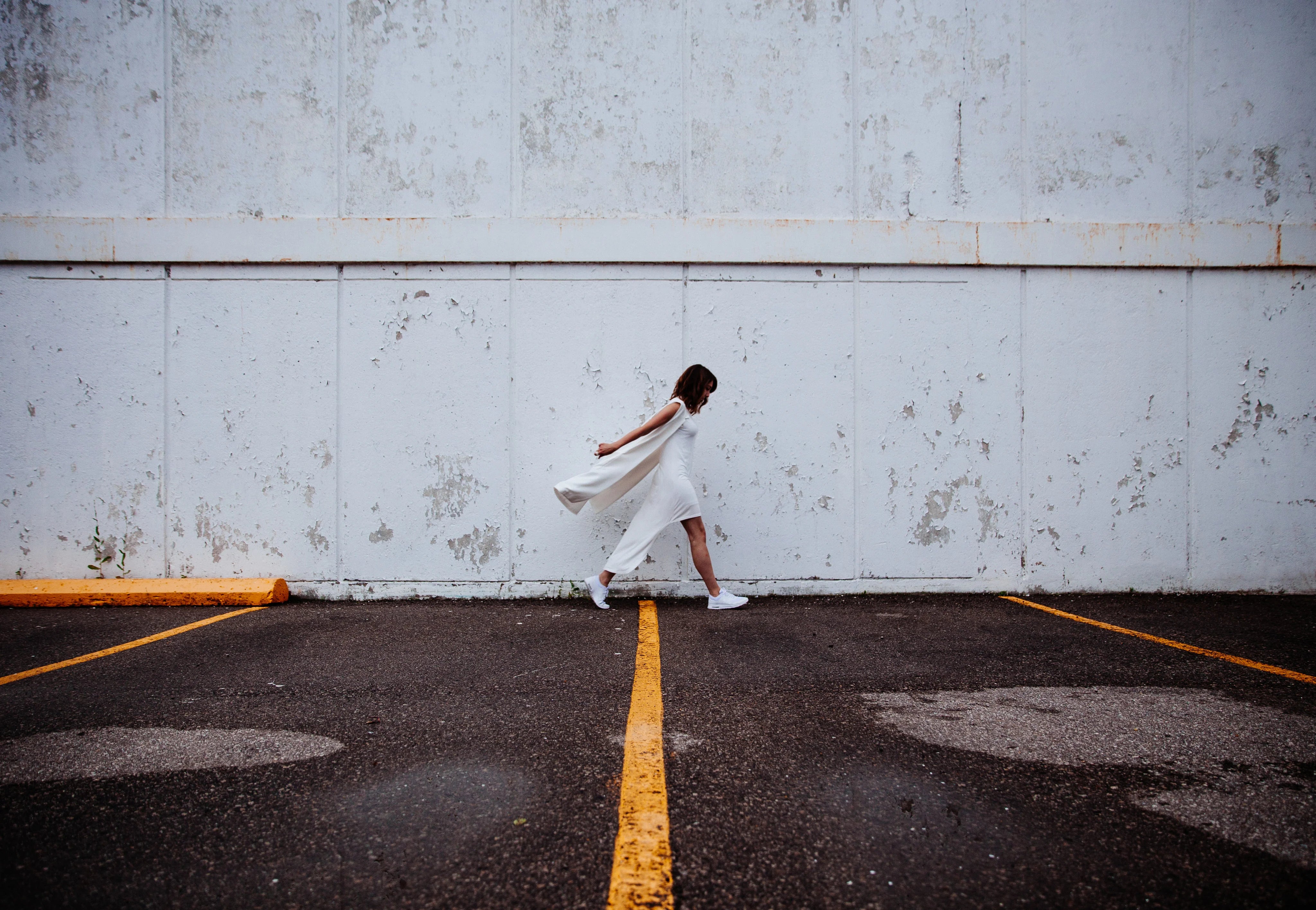 files/woman-in-white-dress-outside.webp